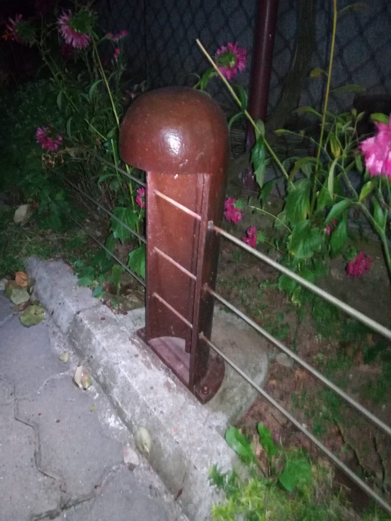 A metal lamp for a yard or garden